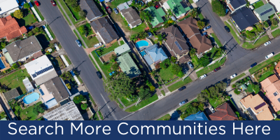A view of some houses from above with the words " more communities ".